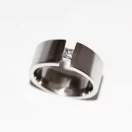 White gold wedding ring with diamond.