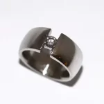 White gold wedding ring with diamond.