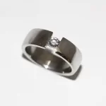 White gold wedding ring with diamond.