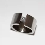 White gold wedding ring with diamond.